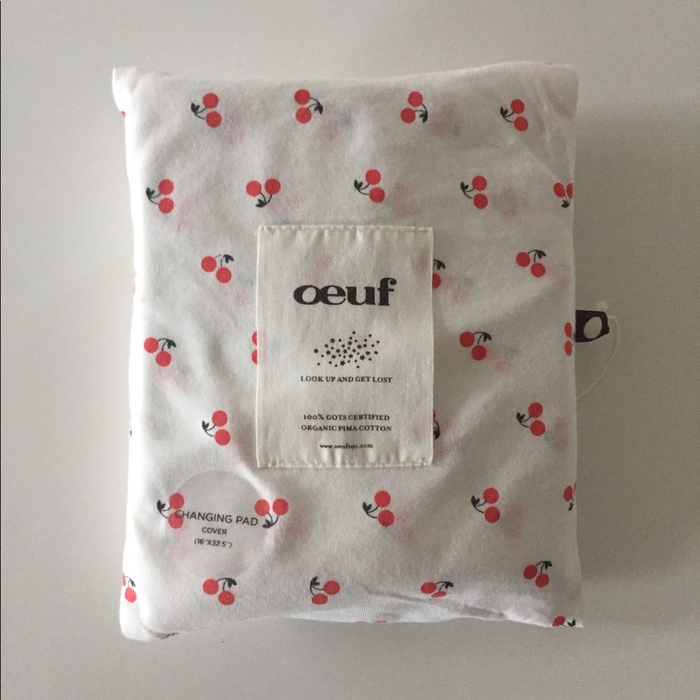 1 crib sheet and 2 Oeuf changing pad covers